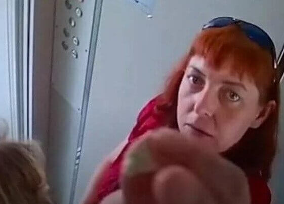 Woman With Something to Hide Puts Gum on Camera Lens